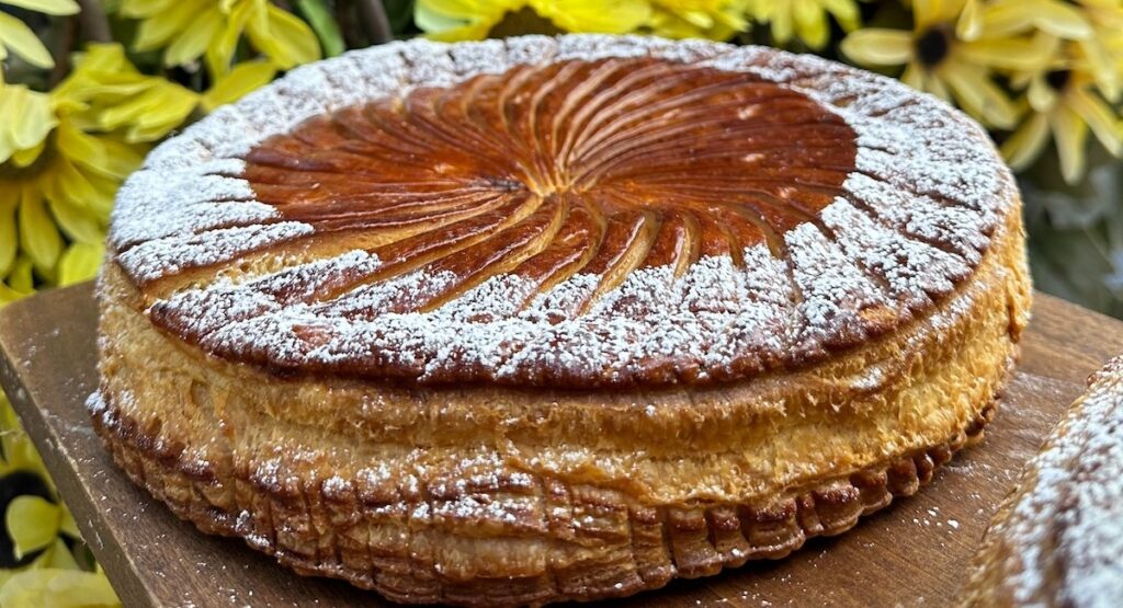 Galette des rois with foliage in background