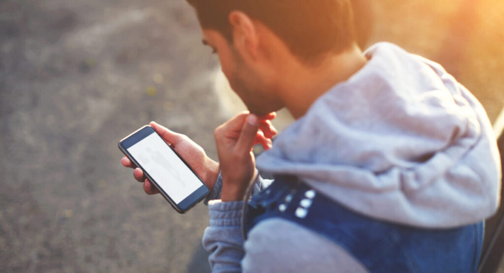 Man using phone.