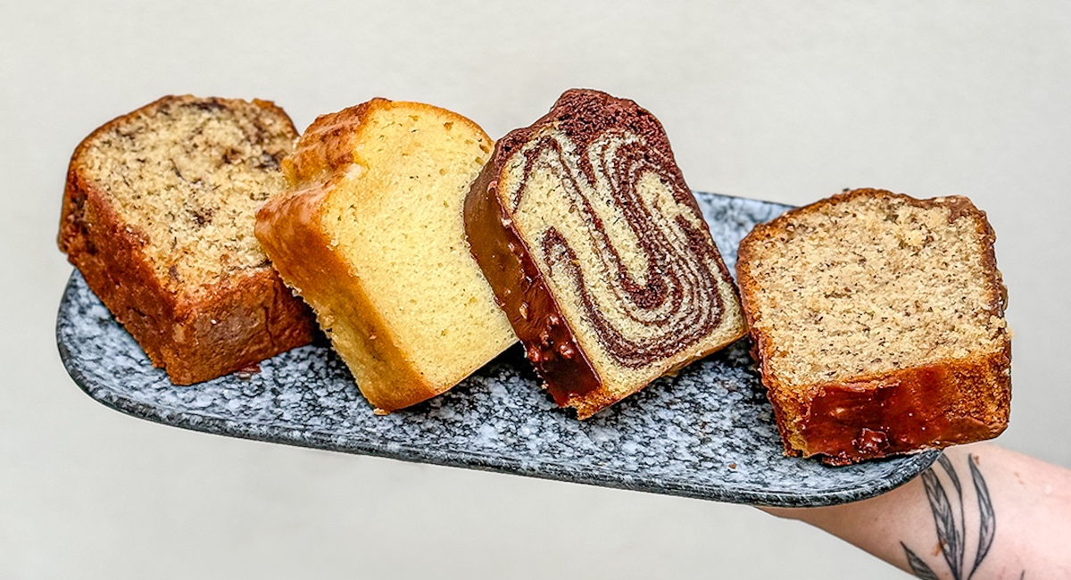 Selection of sliced pound cake on tray.