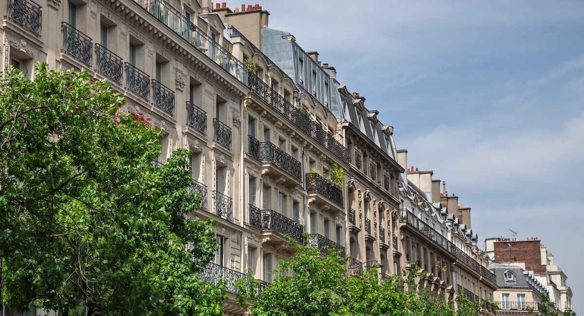Haussmann-style residential facades in Paris a grand boulevard.