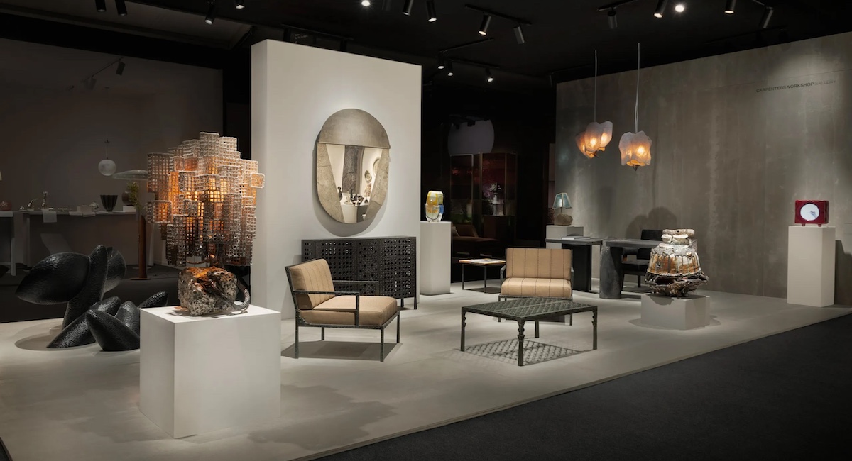 Staged display of modern furniture against gray backdrop.