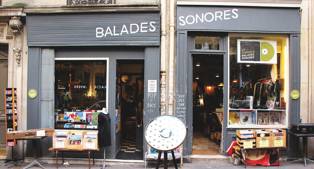 Exterior of Balades Sonores record shop during the day.