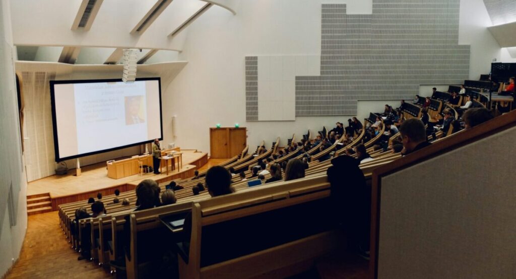 A lecture hall full of students at the university.