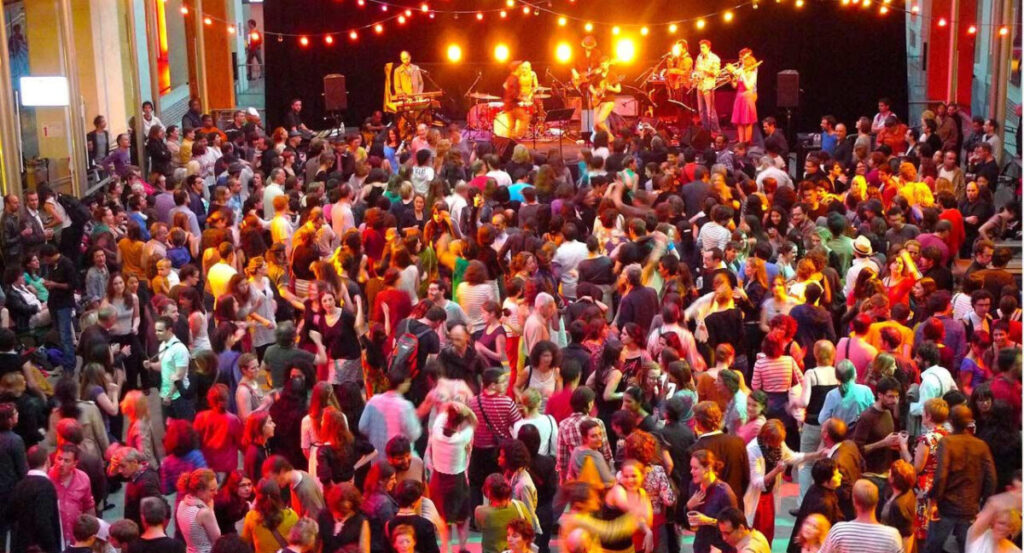 People in front of a concert. 