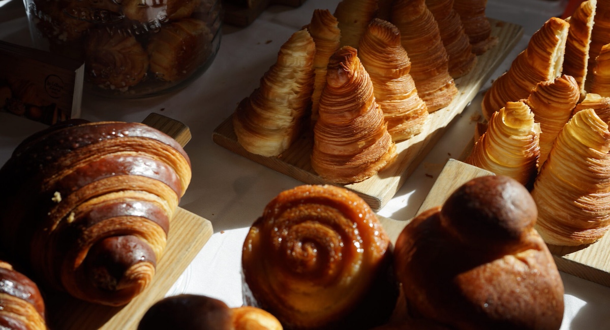 Assortment of croissants and viennoiseries.