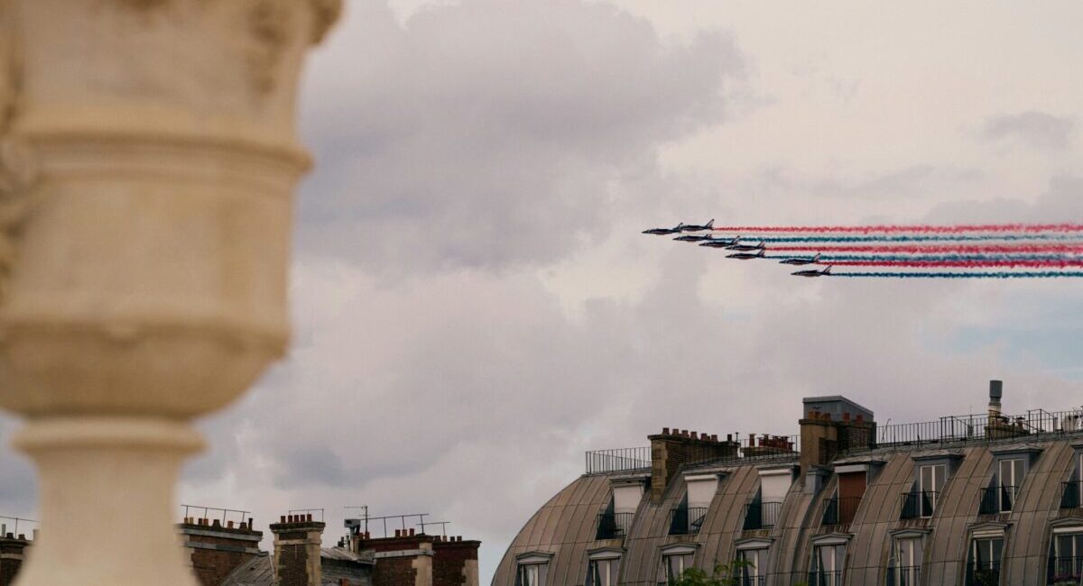 french planes flying over paris, red, white blue