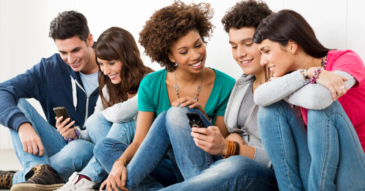 Friends Looking At Cell Phone.