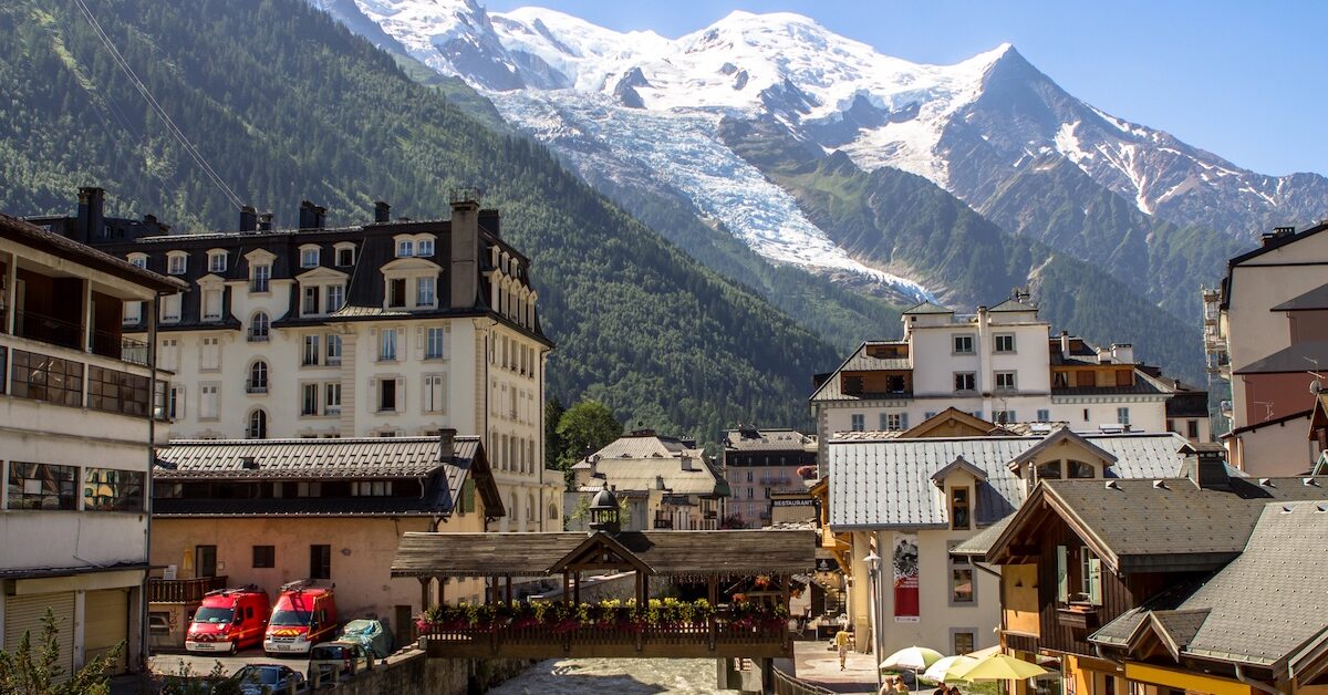 Town of Chamonix-Mont-Blanc in summer, with mountains in the background