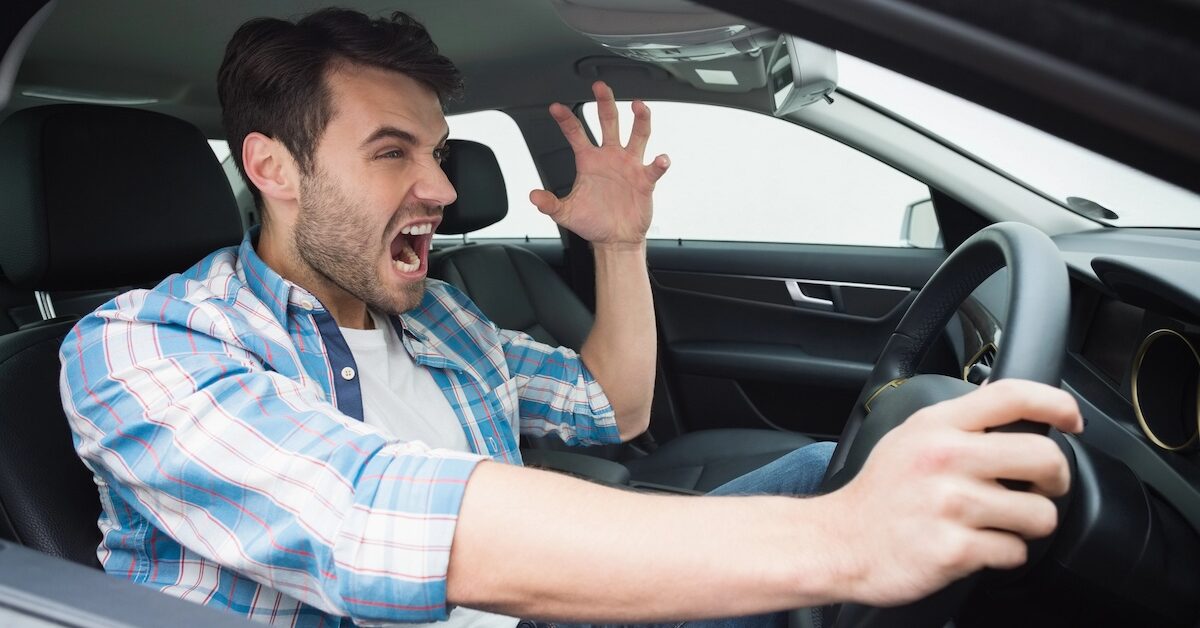 Man screaming in car