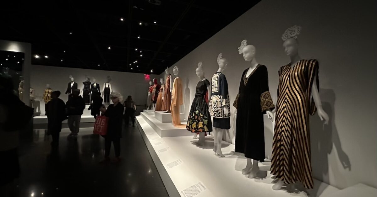 Lineup of mannequins in fashion exhibit