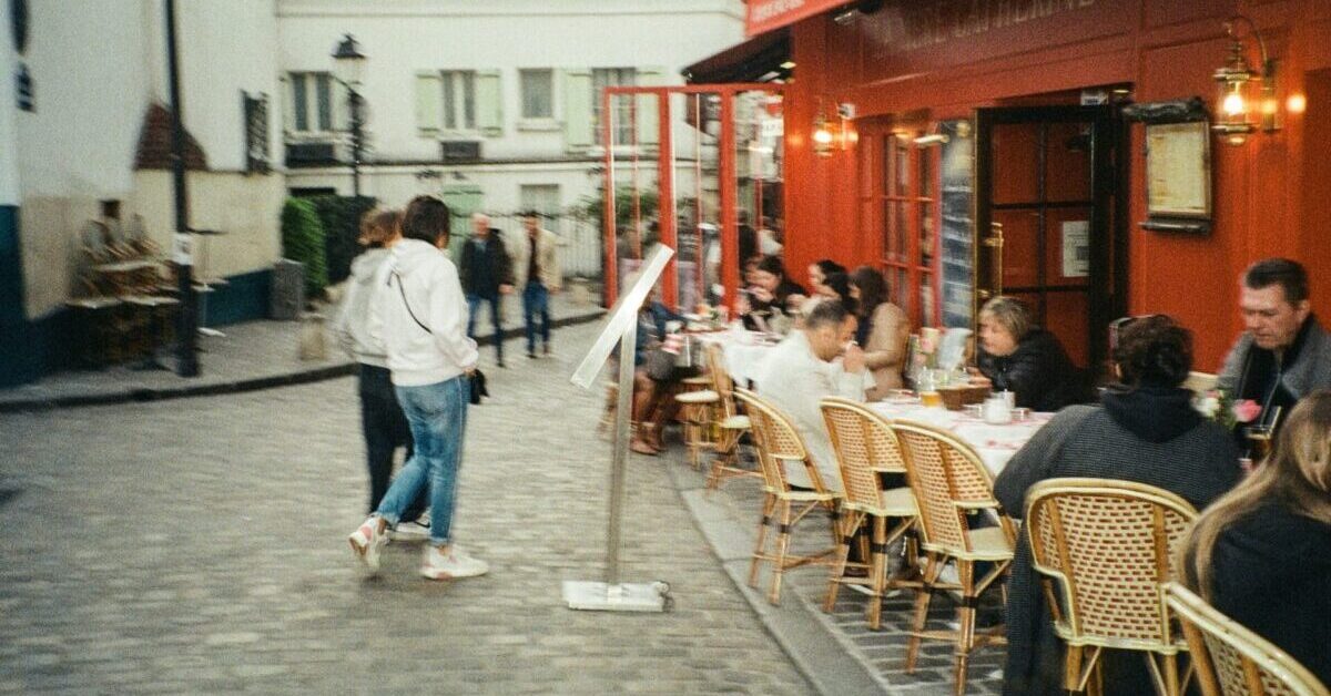 people eating at a terrasse en france