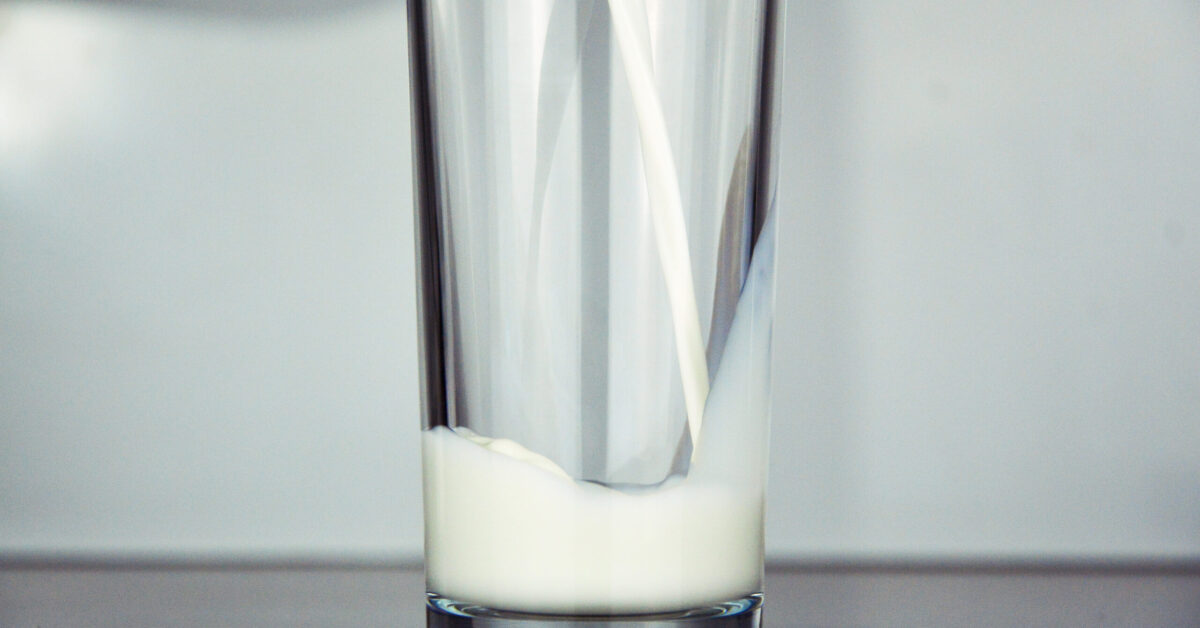 A glass of milk on a counter