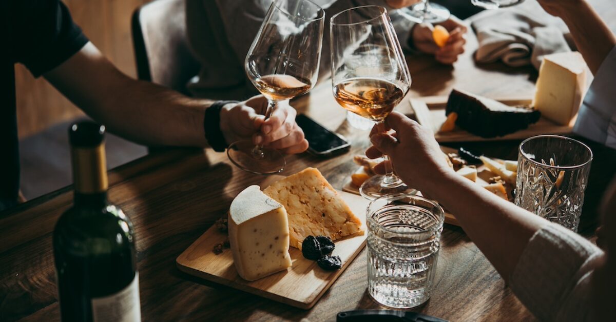 Wine and cheese served for a friendly party in a bar or a restaurant.