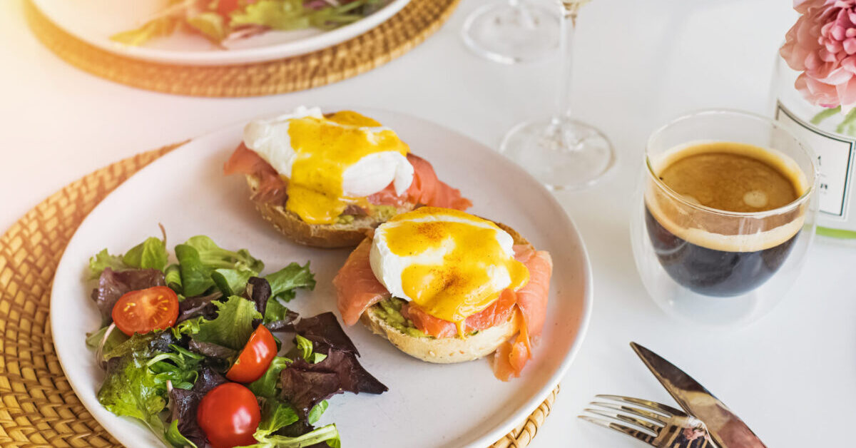 Sunday,Brunch,With,Eggs,Benedict,,Salad,And,Coffee,On,White