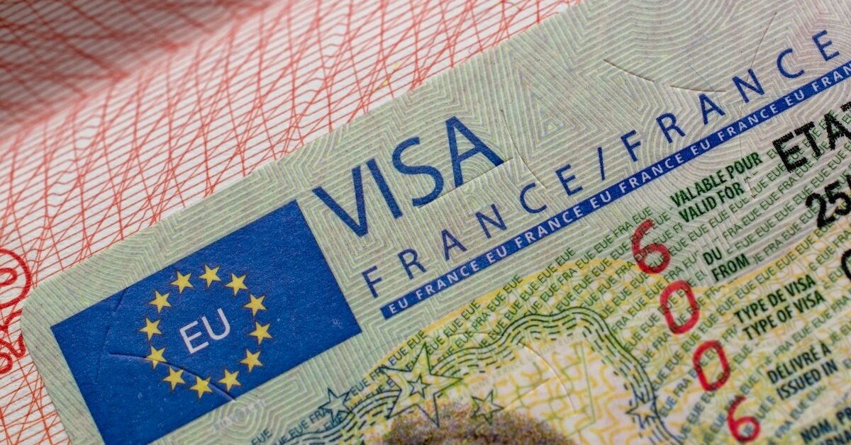 French visa stamp in a travel passport.
