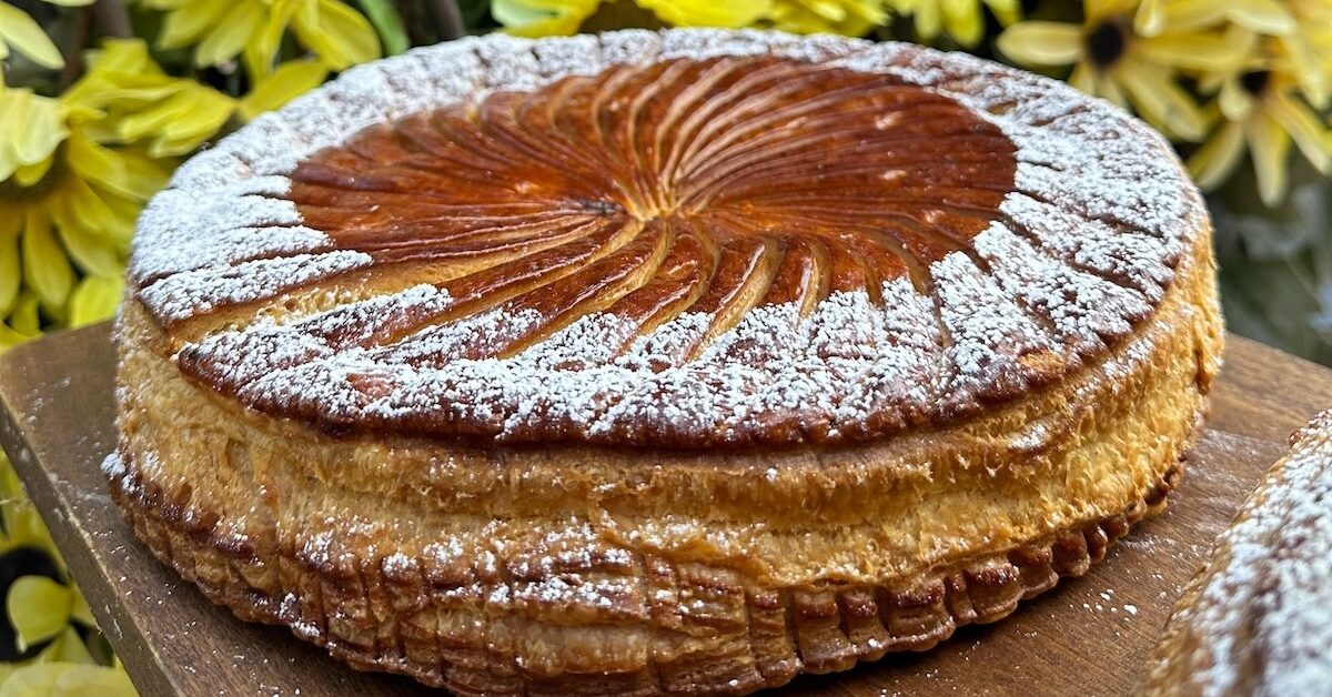 Galette des rois with foliage in background