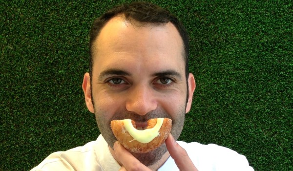A man eating a donut